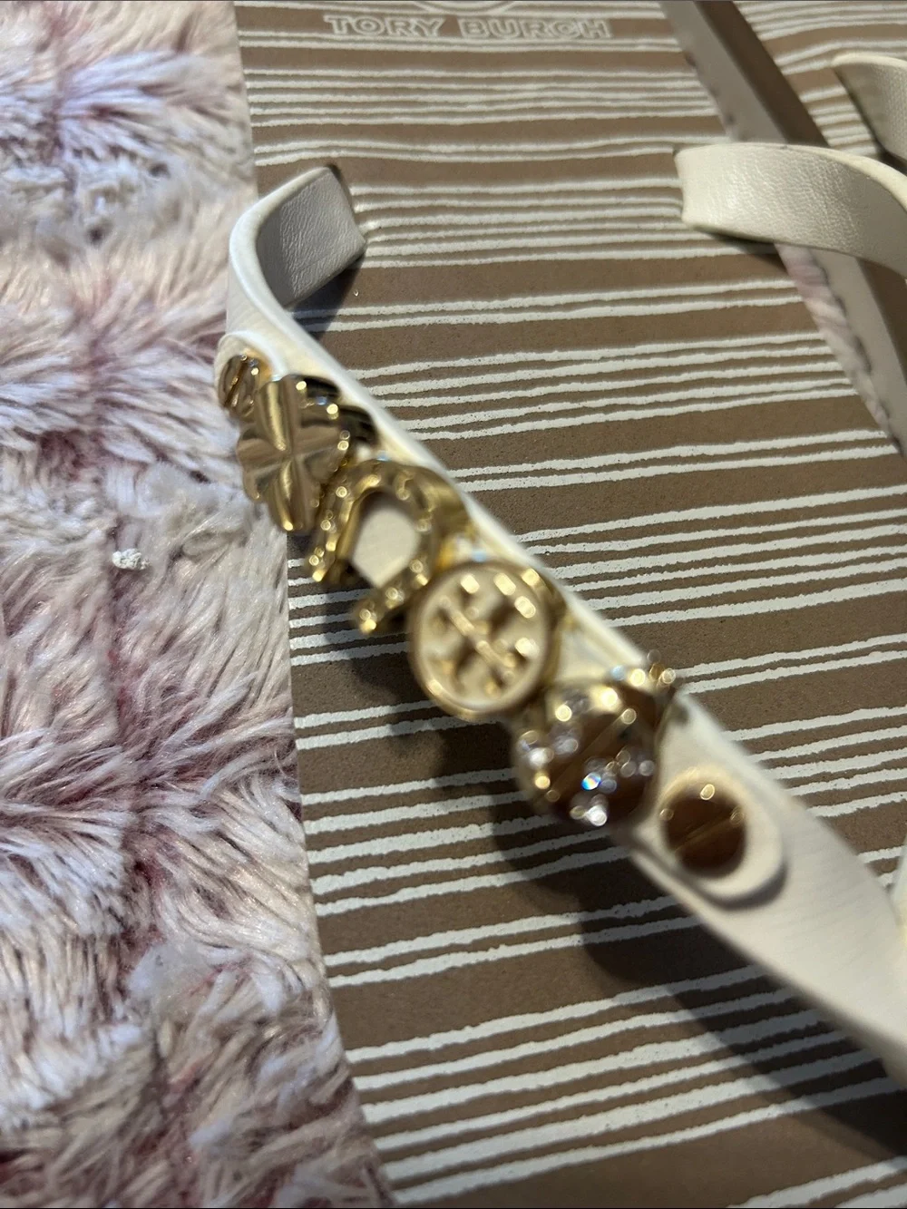 Tory Burch White Strap Striped Footbed Flip Flops with Gold Logo Charms size 9